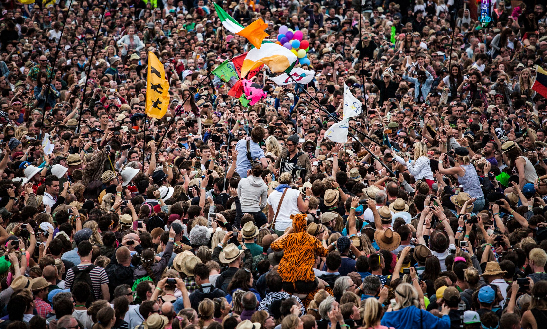 Crowd of People Standing Outdoors